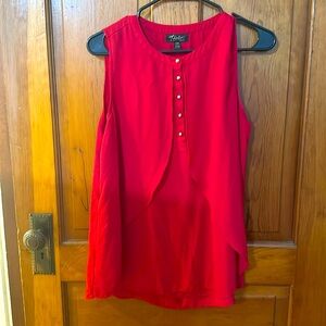 Red blouse with gold buttons